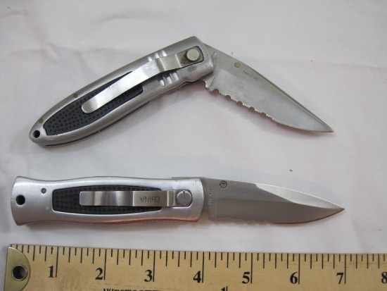 Two Folding Pocket Knives with clips including Master Cutlery with Stainless Blade and one marked
