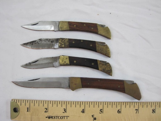 Four Vintage Folding Pocket Knives with Wooden Handles, all marked Pakistan, 7 oz