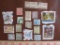 Lot of approx two dozen postage stamps from various countries including Canada, Hungary, Italy and