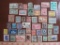 Lot of mostly canceled vintage postage stamps from many foreign countries, including Spain, Romania,