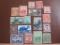 Lot of canceled vintage postage stamps from Australia and Eritrea, along with two unused stamps from
