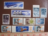 Approximately 10 unused Russian cosmonaut postage stamps, 10K flat edge stamp has hinge blemish