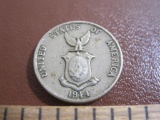 One 1944 five centavos Philippines coin. Back says United States of America