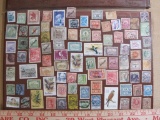 Large lot of mostly foreign postage stamps from Cyprus, Australia, St. Kitts, Barbados, Poland,