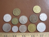 12 European coins, including 8 from France (1916-1976), three Italian coins (1956, 1978 and 1997),