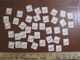Lot of 38 loose 1991 5 cent Canoe 1800s US postage stamps, #2453. Not canceled but missing gum on