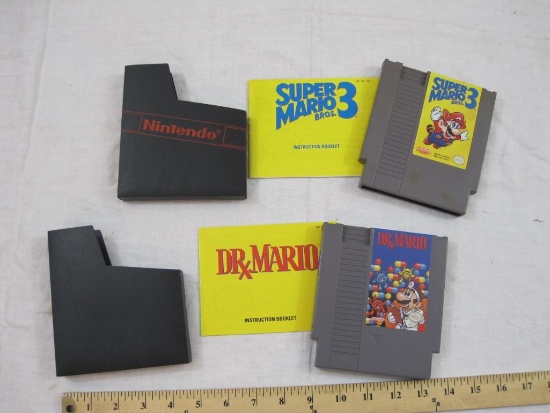 Two Nintendo NES Games including Super Mario 3 and Dr. Mario, both include instruction manuals and