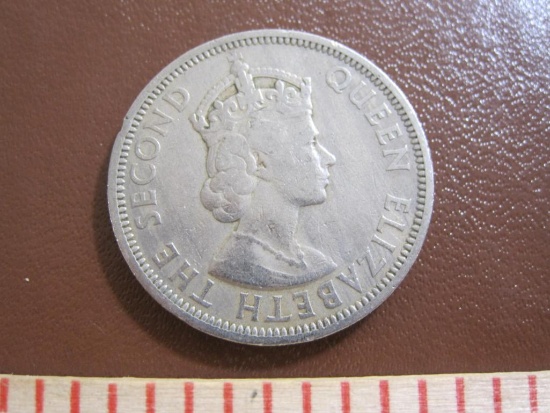 One 1955 British Eastern Caribbean Territories 50 cent piece bearing the image of Queen Elizabeth II