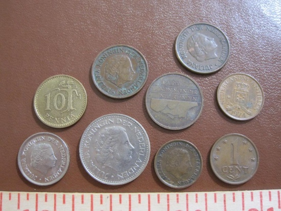 One Finnish 10 pennia coin plus 8 Netherlands coins