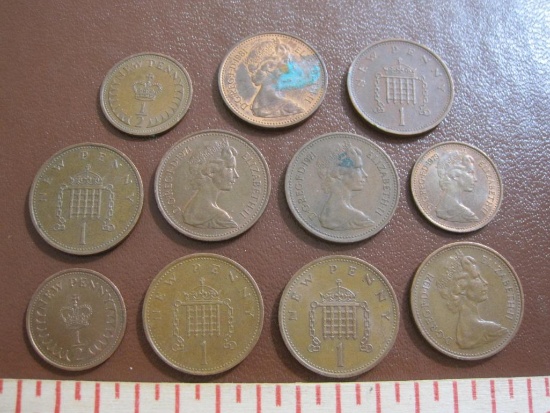 Lot of 8 Great Britain QEII new penny coins (7 1971, one 1981) and three 1/2 new penny coins (1971