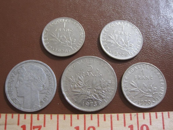 Lot of 5 French coins: one 1973 5 francs, one 1948 2 francs and 3 1 franc (1970, 77 and 78)