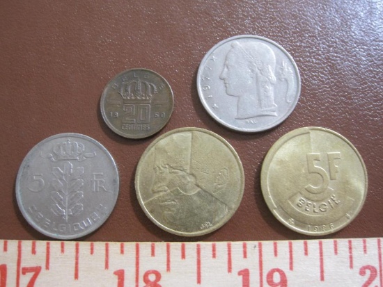 Lot of five Belgian coins: one 1960 20 centimes, two 5 francs (1974 & 77) and two 1986