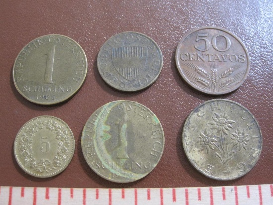 Lot of 6 assorted foreign coins; one Swiss 1982 5 rappen, one Portuguese 1973 50 centavos, one