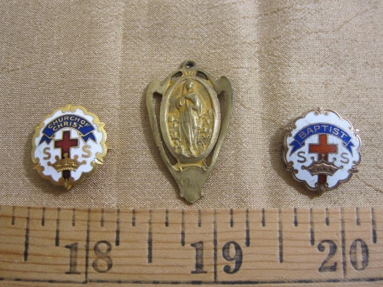 Lot includes a Church of Christ pin, a Jesus pendant and a Baptist pin