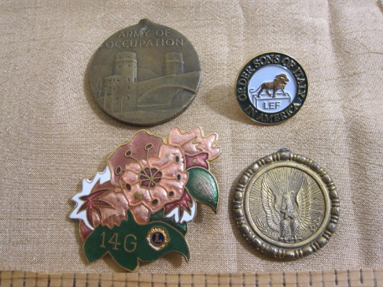 Lot includes 1945 Army of Occupation pendant, Order Sons of Italy in America pin, flower pin and 5