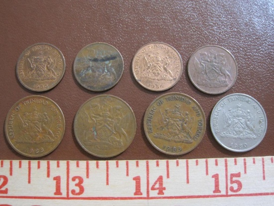 Lot of 8 coins from Trinidad and Tobago: 1 25 cent piece (1980), 3 5 cent pieces (1966 and 1983) and