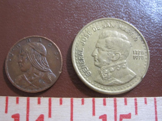 Two coins: one 1982 Republic of Panama un centesimo coin and one 1978 Argentina 50 pesos coin