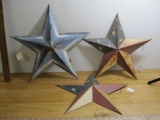 Three decorative galvanized metal and painted Stars
