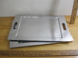 Two rectangular aluminum serving trays, 19.5