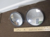 Two round 7 inch spot mirrors