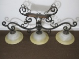 Large hanging light fixture with three glass lamp shades; 47