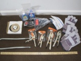 Bucklet lot of assorted tools including working gloves, pliers, vacuum accessories and more