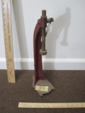 Vintage red iron bottle capper with anchor design