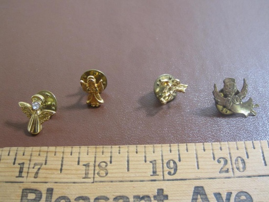 Lot of four angel pins