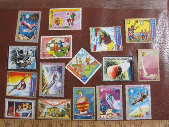 Lot of 16 colorful canceled Equatorial Guinea postage stamps with space and sports themes