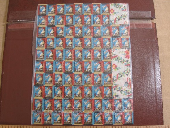 Partial sheet of 88 1943 American Lung Association US Christmas Seals; sheet in enlosed in