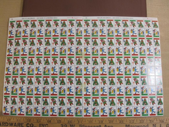 TWO full sheets of 100 1974 American Lung Association US Christmas seals; sheets are attached via