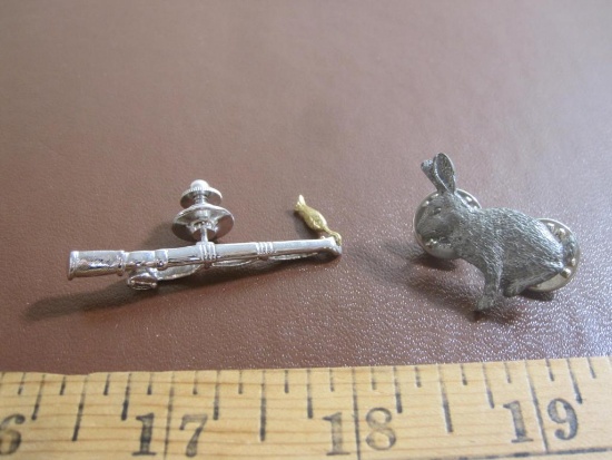 Lot of two outdoors-themed pins; one bunny rabbit, one fishing pole w/ fish