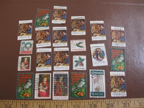 Lot of approximately 20 cancelled Christmas-themed US postage stamps including 1971 Partridge & Pear
