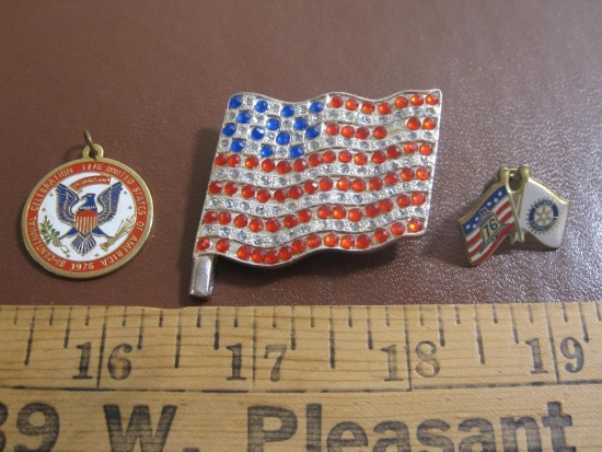 Lot includes two UA flag pins and one 1976 Bicentennial Celebreation of the USA pendant
