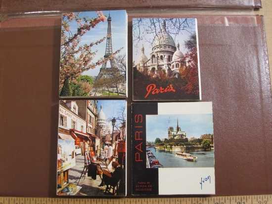 Four small souvenir photo booklets of Paris