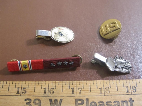 Lot includes two pins (one US and one US military) and two tie clips (one featuring an antique car