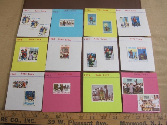 Lot inlcudes 12 dated dispay cards with 1960s/70s era stamps commemorating Boys Town, Nebraska