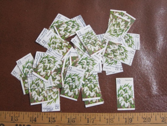 Lot of more than TWO DOZEN cancelled 1996 32 cent Snowdrop US postage stamps, Scott # 3028