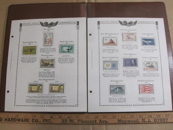 Two completed stamp collecting album pages printed by Minkus publications; includes fourteen mounted