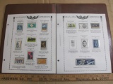 Two stamp collecting album pages printed by Minkus Publications; includes fifteen mounted mint