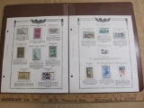 Two stamp collecting album pages printed by Minkus Publications; includes 10 mounted mint US postage