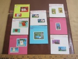 Lot includes 8 dated display cards with hinged 1960s-era stamps commemorating the American Bible