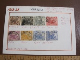 Eight hinged canceled 1922-23 Malaya stamps. They are 