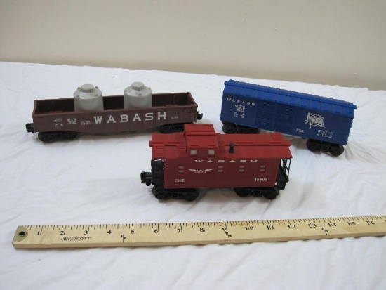 Three Lionel Wabash Train Cars including Gondola 16309, Boxcar, and Radio Caboose 16505, O Scale