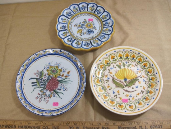 THREE signed hand-painted porcelain plates