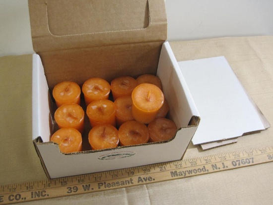 Partial box of small Orange Clove scented Strictly Vermont candles