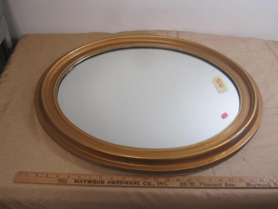 Ornate framed circular hanging wall mirror, 27" x 23"