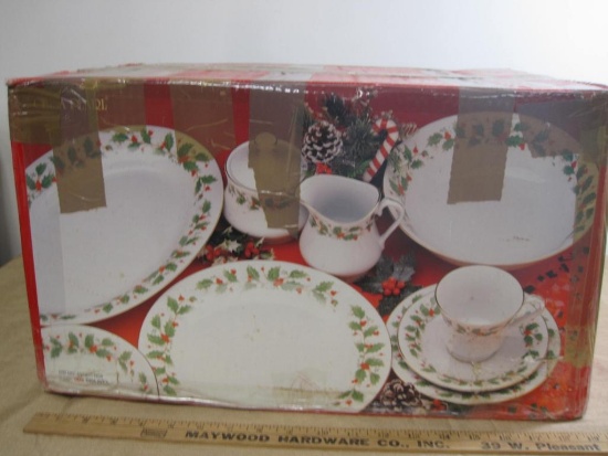 Full box of 45 piece Christmas dish set, includes 8 cups, 8 saucers, 8 soup bowls, 8 salad plates,