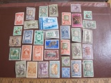 Mixed lot of more than TWO DOZEN foreign postage stamps from Ethiopia, British Honduras and Belgian