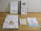 Lot of Books and Metal Mermaid Sign